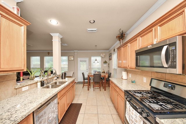 20310 Port Bishop Ln, Richmond, TX 77407 - kitchen featuring appliances with stainless steel finishes, ornamental molding, light brown cabinetry, backsplash, and light tile patterned flooring