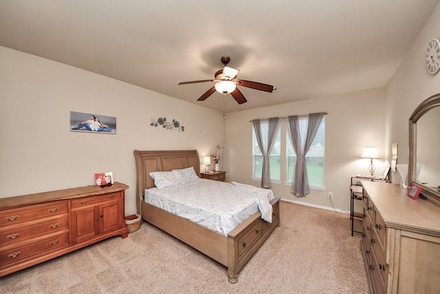 20310 Port Bishop Ln, Richmond, TX 77407 - bedroom with light carpet and a ceiling fan