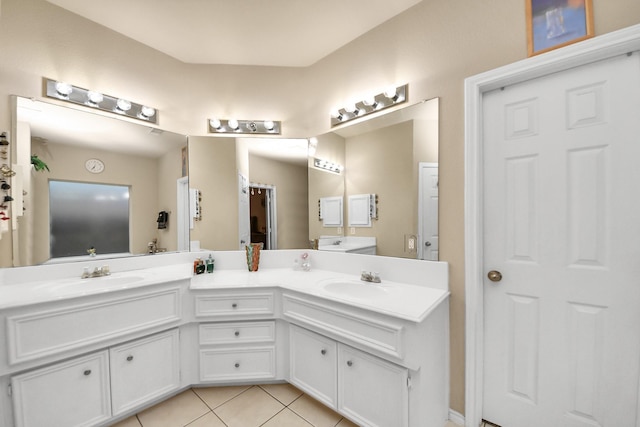 20310 Port Bishop Ln, Richmond, TX 77407 - bathroom featuring double vanity and tile patterned flooring