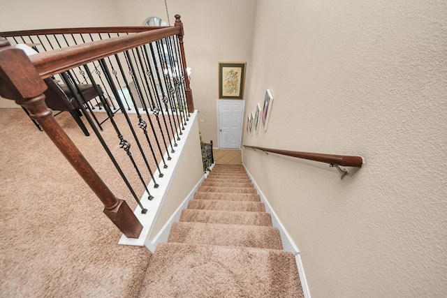 20310 Port Bishop Ln, Richmond, TX 77407 - stairs featuring carpet floors and a textured wall