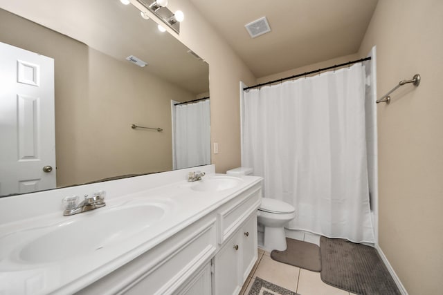 20310 Port Bishop Ln, Richmond, TX 77407 - bathroom with double vanity and tile patterned floors