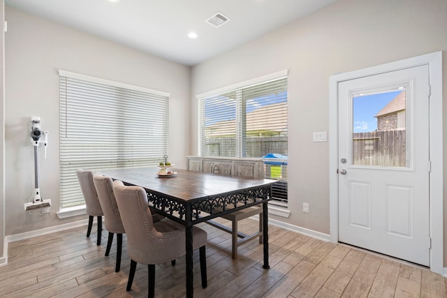 31230 Pinebrook Falls Ln SE, Hockley, TX 77447 - dining area with light wood finished floors and recessed lighting