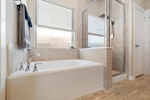 31230 Pinebrook Falls Ln SE, Hockley, TX 77447 - bathroom with a garden tub and a shower stall