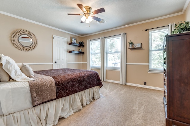 11823 Solon Springs Dr, Tomball, TX 77375 - bedroom with light colored carpet, ornamental molding, and ceiling fan
