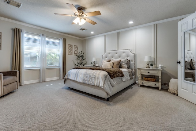 11823 Solon Springs Dr, Tomball, TX 77375 - bedroom with crown molding, light carpet, recessed lighting, a ceiling fan, and a textured ceiling