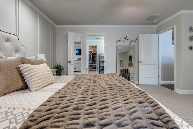 11823 Solon Springs Dr, Tomball, TX 77375 - carpeted bedroom featuring crown molding and a spacious closet