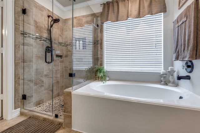 11823 Solon Springs Dr, Tomball, TX 77375 - full bath featuring a garden tub, a stall shower, crown molding, plenty of natural light, and tile patterned flooring