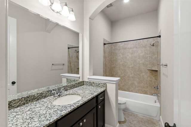 23411 Reynolds Pond Dr, New Caney, TX 77357 - bathroom with vanity, tub / shower combination, and tile patterned flooring