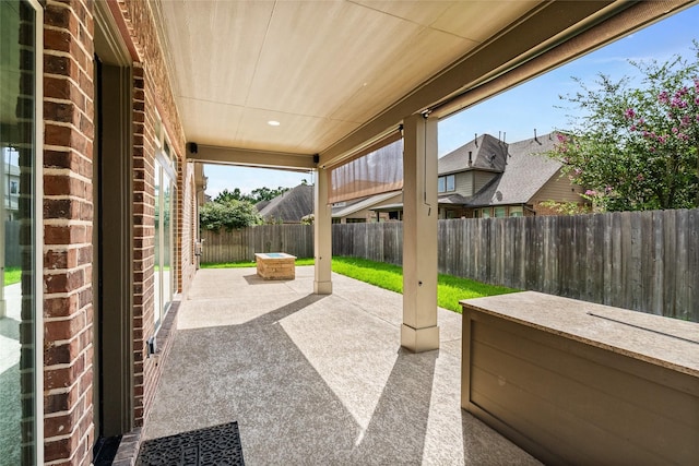 23411 Reynolds Pond Dr, New Caney, TX 77357 - fenced backyard featuring a patio area