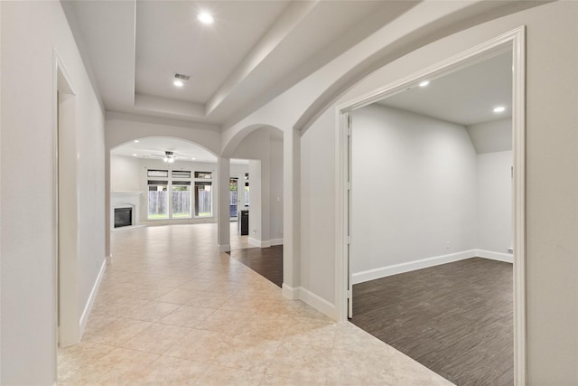 23411 Reynolds Pond Dr, New Caney, TX 77357 - hallway featuring recessed lighting, tile patterned floors, and arched walkways