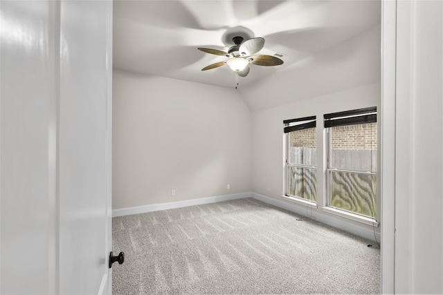 23411 Reynolds Pond Dr, New Caney, TX 77357 - empty room featuring ceiling fan, carpet, and vaulted ceiling