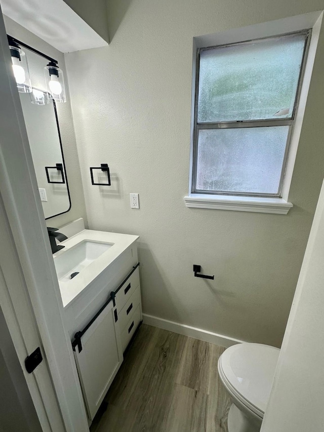 5507 Mossy Timbers Dr, Humble, TX 77346 - half bathroom with vanity and wood finished floors