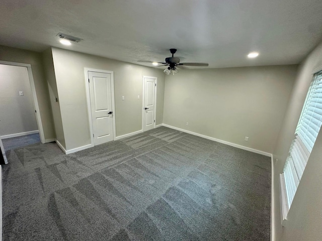 5507 Mossy Timbers Dr, Humble, TX 77346 - unfurnished room featuring a ceiling fan and dark colored carpet