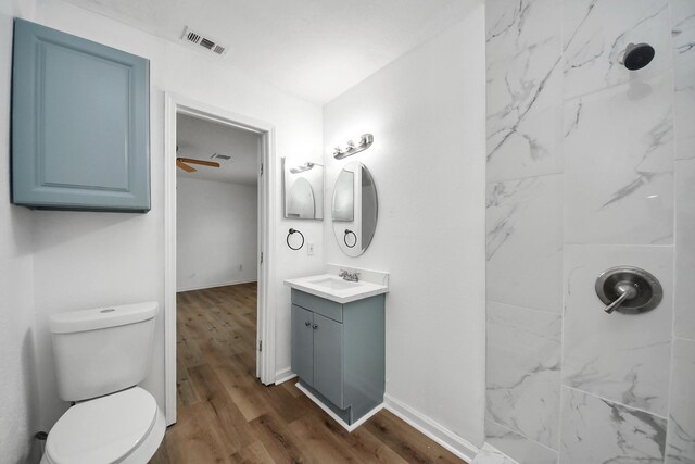 9250 Wiloak St, Houston, TX 77028 - bathroom with vanity, a shower, and wood finished floors