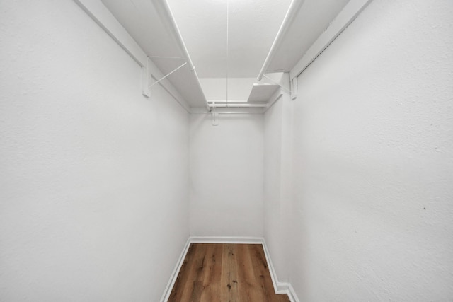 9250 Wiloak St, Houston, TX 77028 - spacious closet featuring wood finished floors