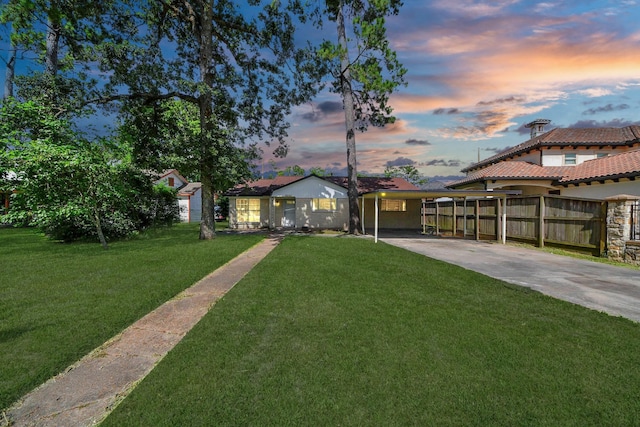 9250 Wiloak St, Houston, TX 77028 - view of front of home with concrete driveway, stucco siding, and a tile roof