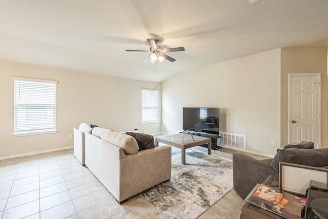 6328 Dorothy Muree Dr, Temple, TX 76502 - living room with a ceiling fan, vaulted ceiling, and light tile patterned flooring