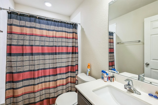 6328 Dorothy Muree Dr, Temple, TX 76502 - bathroom with vanity, a textured wall, and curtained shower