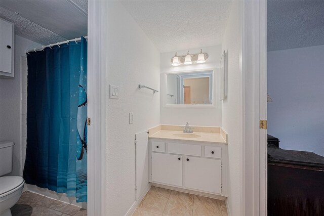 1505 Ward Rd Unit 118, Baytown, TX 77520 - full bathroom with a textured ceiling, vanity, and curtained shower