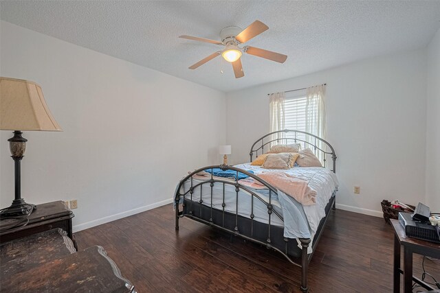 1505 Ward Rd Unit 118, Baytown, TX 77520 - bedroom with wood finished floors, a textured ceiling, and a ceiling fan