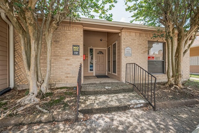 1505 Ward Rd Unit 118, Baytown, TX 77520 - doorway to property with brick siding