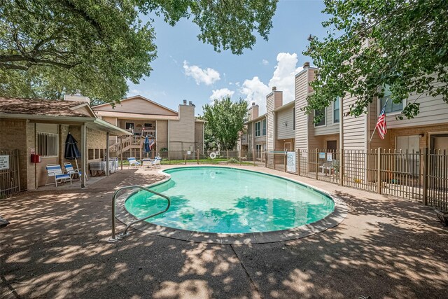 1505 Ward Rd Unit 118, Baytown, TX 77520 - community pool featuring a patio