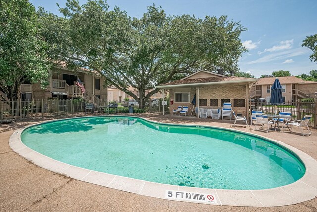 1505 Ward Rd Unit 118, Baytown, TX 77520 - community pool with a patio
