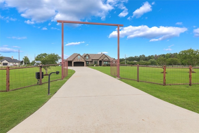 2915 Kennings Rd, Crosby, TX 77532 - view of front of house featuring a garage and concrete driveway