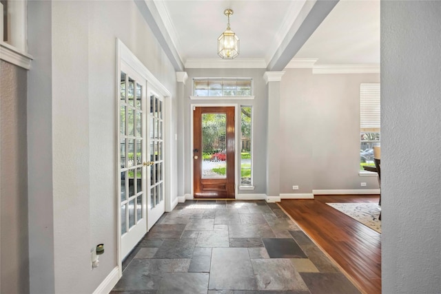 5715 Ashley Spring Ct, Katy, TX 77494 - foyer with ornamental molding, stone tile flooring, and french doors