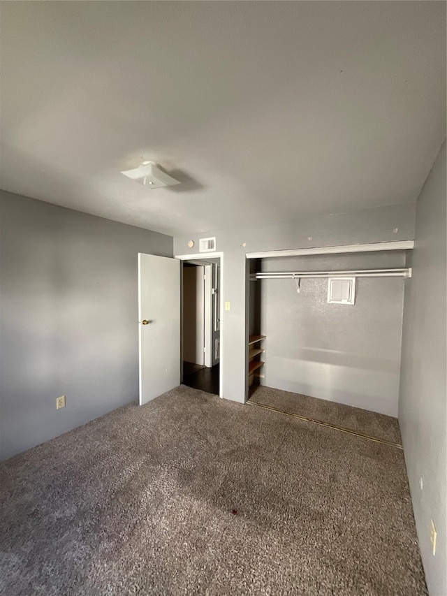 7200 Clarewood Dr Unit 10, Houston, TX 77036 - unfurnished bedroom featuring carpet flooring and a ceiling fan