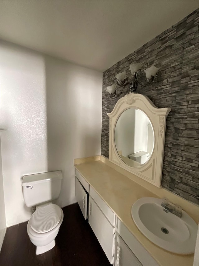 7200 Clarewood Dr Unit 10, Houston, TX 77036 - half bathroom featuring vanity and toilet