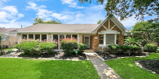5422 Jason St, Houston, TX 77096 - view of front facade featuring a front lawn and brick siding