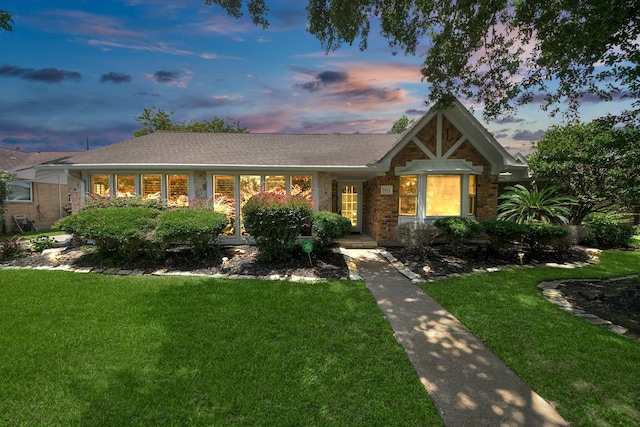 5422 Jason St, Houston, TX 77096 - ranch-style house with a front yard and brick siding