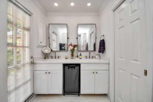 5422 Jason St, Houston, TX 77096 - bathroom with double vanity, crown molding, tile patterned floors, and recessed lighting