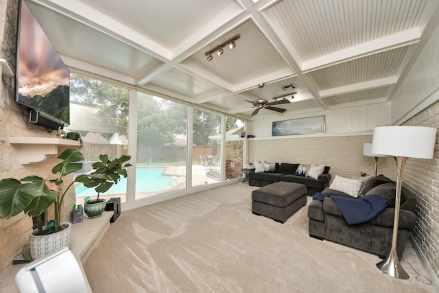 5422 Jason St, Houston, TX 77096 - sunroom with outdoor lounge area, a ceiling fan, plenty of natural light, beamed ceiling, and coffered ceiling