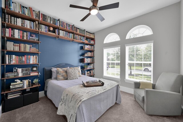 31276 New Forest Park Ln, Spring, TX 77386 - carpeted bedroom with baseboards and ceiling fan