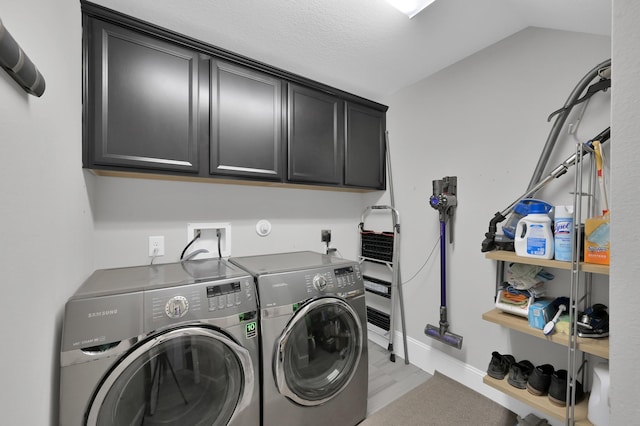 31276 New Forest Park Ln, Spring, TX 77386 - laundry room featuring washer and dryer and cabinet space