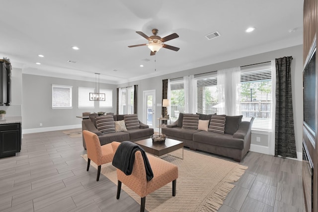 31276 New Forest Park Ln, Spring, TX 77386 - living room featuring ceiling fan, a chandelier, and recessed lighting