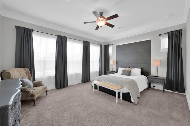 31276 New Forest Park Ln, Spring, TX 77386 - bedroom with multiple windows, light colored carpet, and a ceiling fan