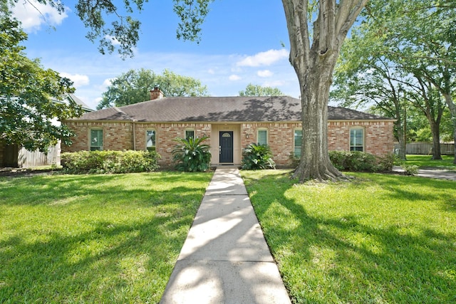 3103 Fairway Dr, Sugar Land, TX 77478 - ranch-style house with brick siding, a chimney, and roof with shingles