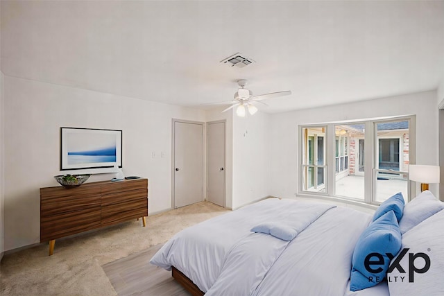3103 Fairway Dr, Sugar Land, TX 77478 - bedroom with light colored carpet and ceiling fan
