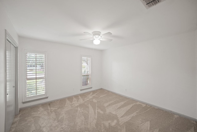 3103 Fairway Dr, Sugar Land, TX 77478 - carpeted empty room featuring plenty of natural light and ceiling fan
