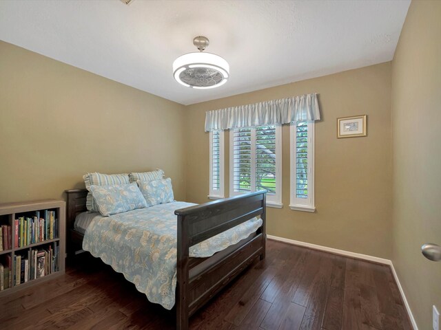 3219 Almond Creek Dr, Houston, TX 77059 - bedroom featuring dark wood-style flooring