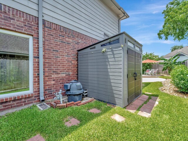 3219 Almond Creek Dr, Houston, TX 77059 - exterior view of brick siding and pump