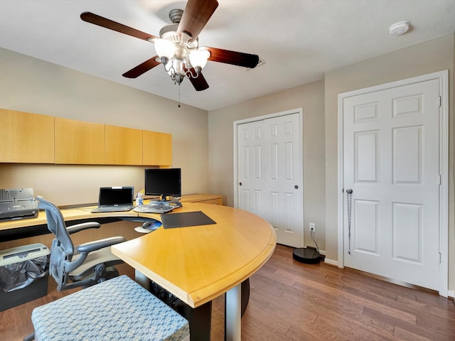 3219 Almond Creek Dr, Houston, TX 77059 - office with a ceiling fan and wood finished floors