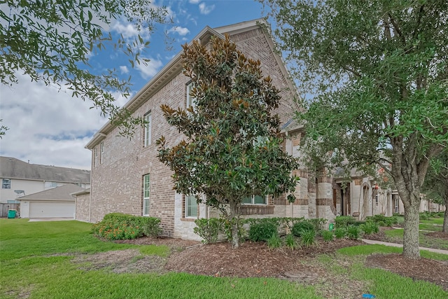 9107 Solvista Pass Ln, Houston, TX 77070 - view of side of property with brick siding and a lawn