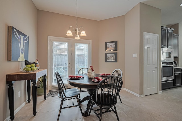 9107 Solvista Pass Ln, Houston, TX 77070 - dining room featuring a chandelier, light tile patterned floors, and french doors