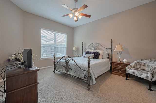 9107 Solvista Pass Ln, Houston, TX 77070 - carpeted bedroom featuring baseboards and ceiling fan