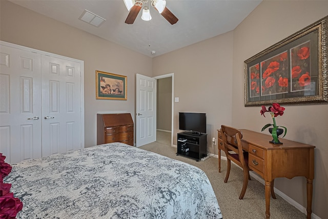 9107 Solvista Pass Ln, Houston, TX 77070 - bedroom with light colored carpet, a closet, and ceiling fan