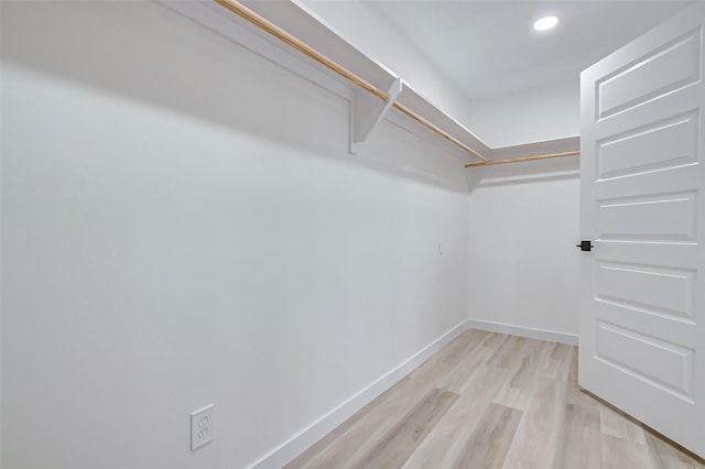 7226 Troulon Dr, Houston, TX 77074 - spacious closet with light wood finished floors